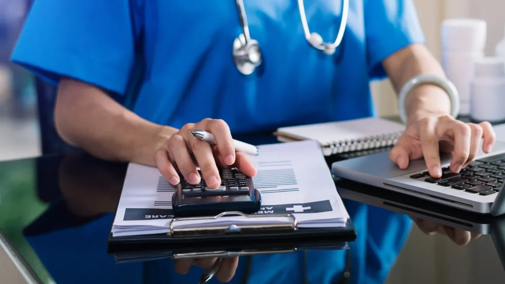 Doctor checking patient form for prior auth requirements