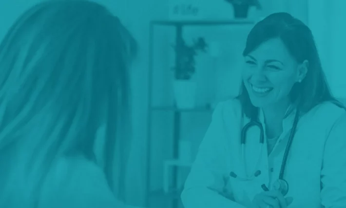 Healyhcare Provider and patient interacting in a healthcare appointment